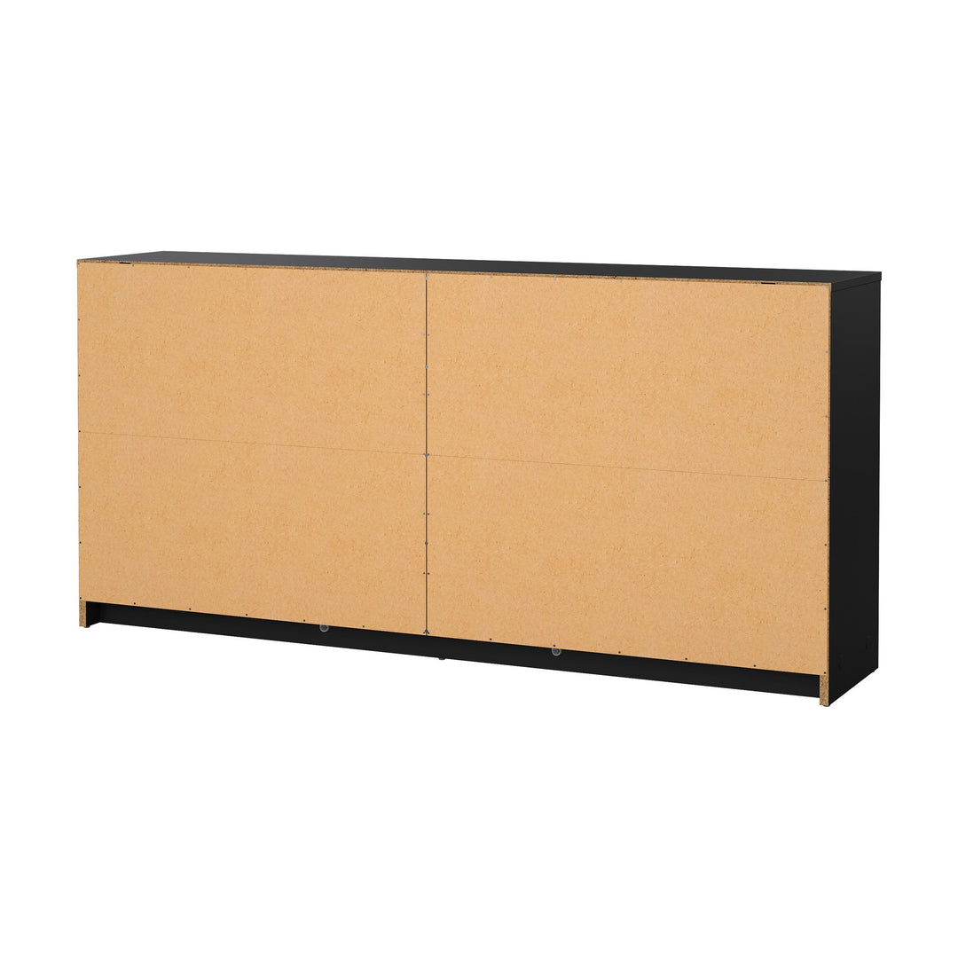May kommode i sort sett bakfra, med lys MDF-bakplate