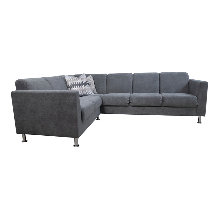 Korfu hjørnesofa i mørk grå stoff med krombein, sett fra siden.
