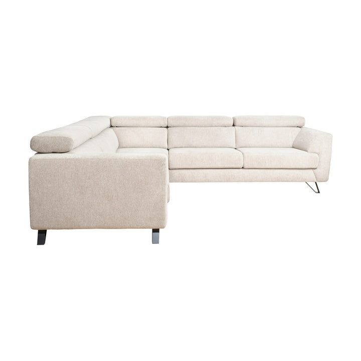 Billund hjørnesofa i beige stoff med oppfelte nakkestøtter, sett fra siden