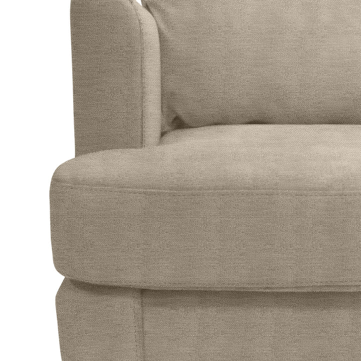 Justin hjørnesofa i beige stoff, nærbilde av armlene og myk setepute