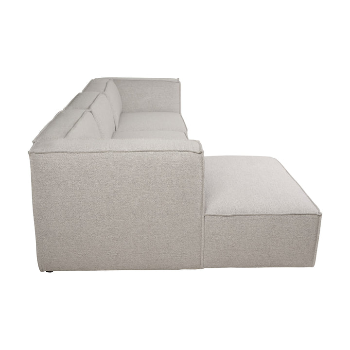 Beacon hjørnesofa i beige stoff, sideprofil fra motsatt side, mot hvit bakgrunn.