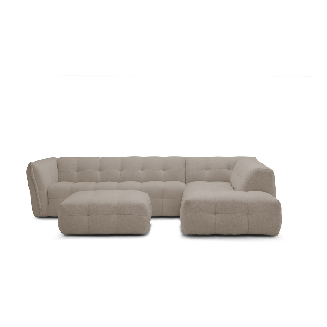 Bellus Moby modulsofa i greige bouclé med open end og puff, sett forfra