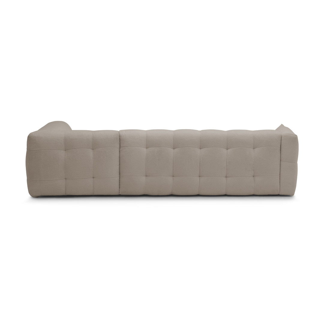 Bellus Moby sofa i greige bouclé med åpen ende, sett bakfra