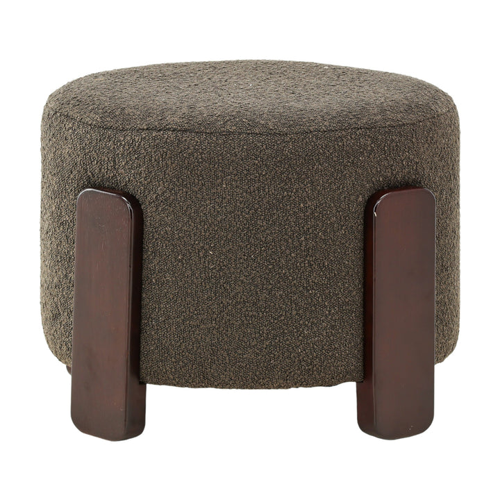 Coffey puff i gråbrun bouclé med mørke treben, sett forfra.