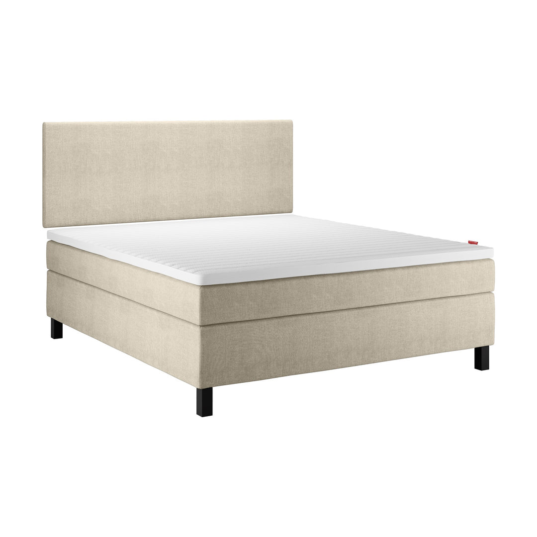 Wonderland W50 sengegavl i beige, kontinentalseng med hvit toppmadrass og svarte ben