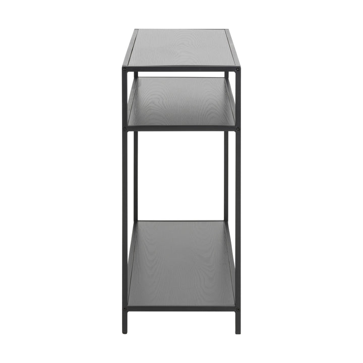 Seaford konsollbord i sort med hyller og sort metallramme, sett fra siden